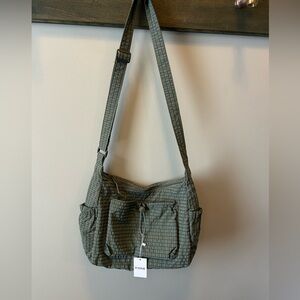 Green Pomme crossbody bag.